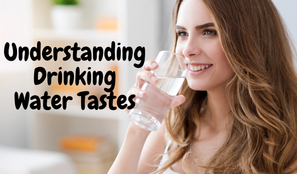 a smiling lady drinking filtered water