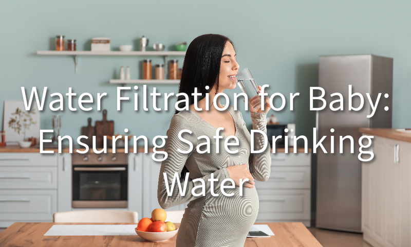 a pregnant woman holding her baby bump while drinking water in the kitchen 