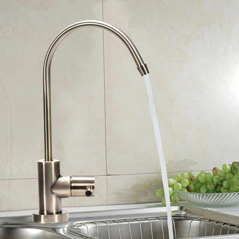 NU Aqua Antique Brass Designer Reverse Osmosis Faucet - installed on countertop with water running